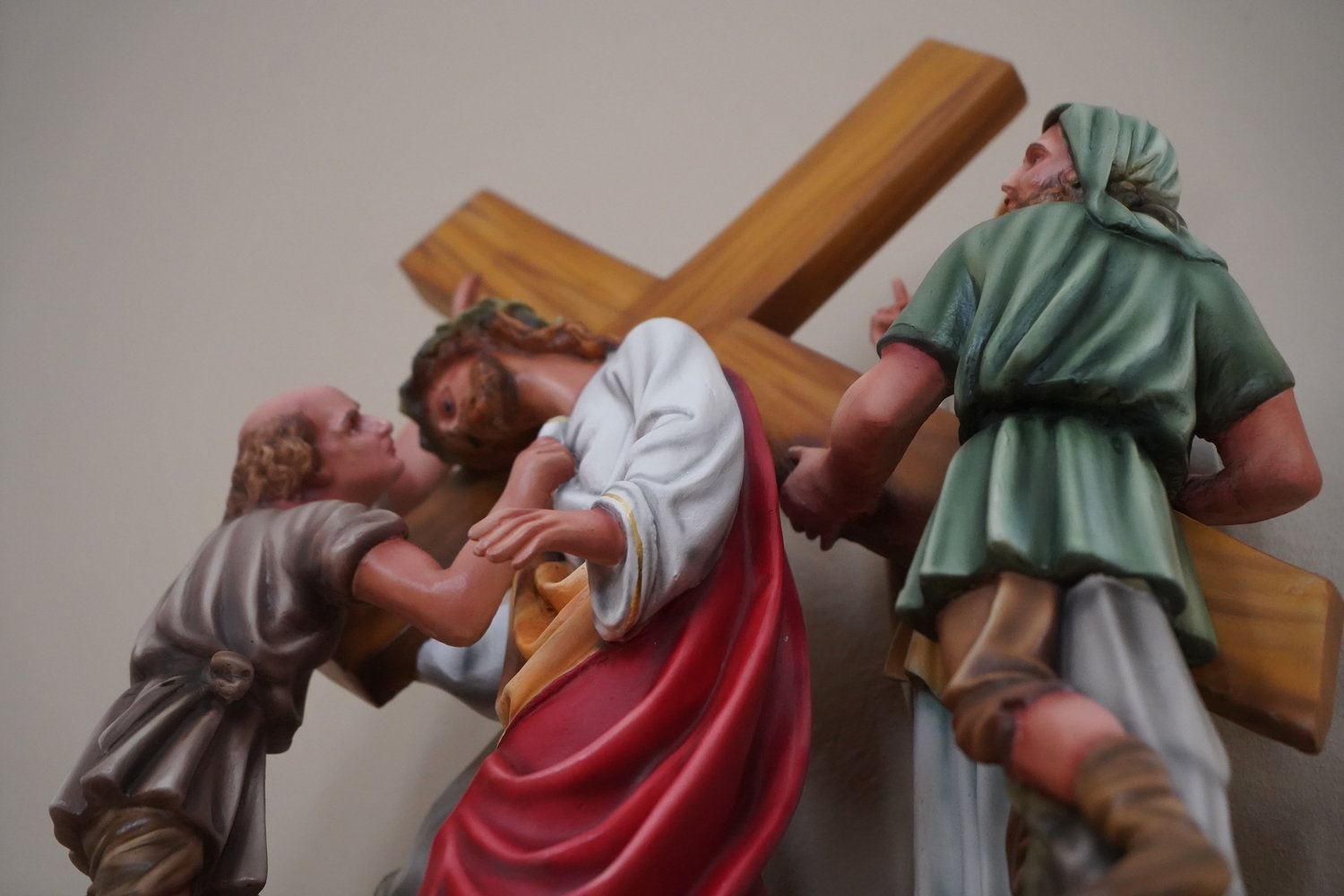 A close-up image of the newly restored Fifth Station: “Simon Helps Jesus Carry His Cross,” in St. Joseph Church in Palmyra.